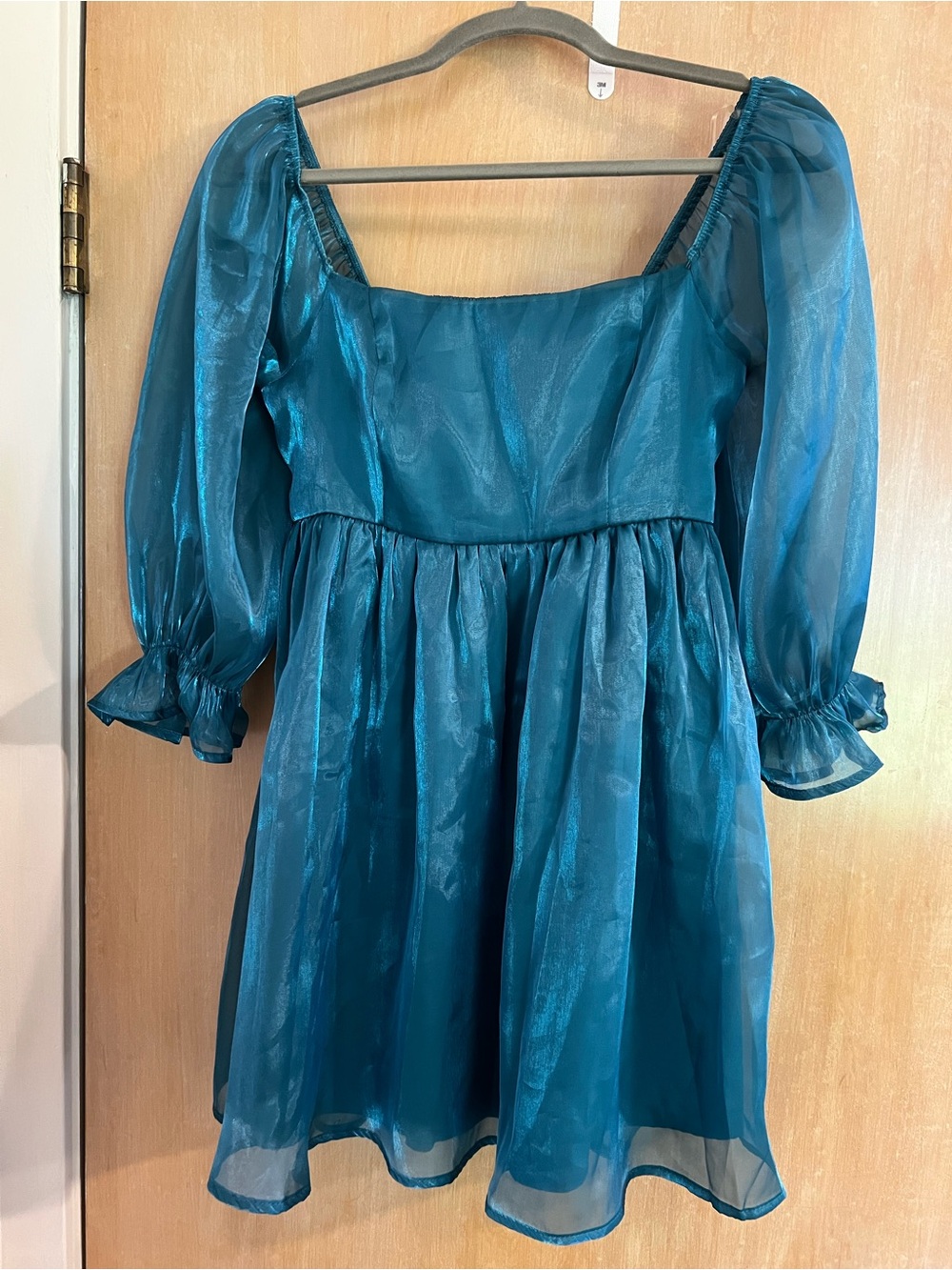 Woman’s Teal Organza Party Dress with Puff Sleeves